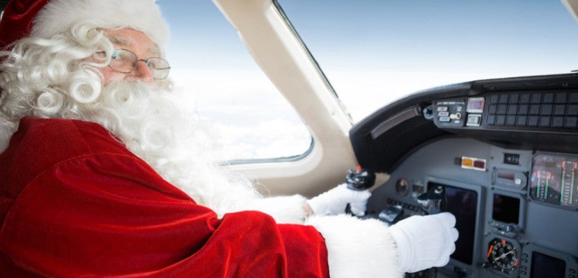 Santa Flying a Plane Featured