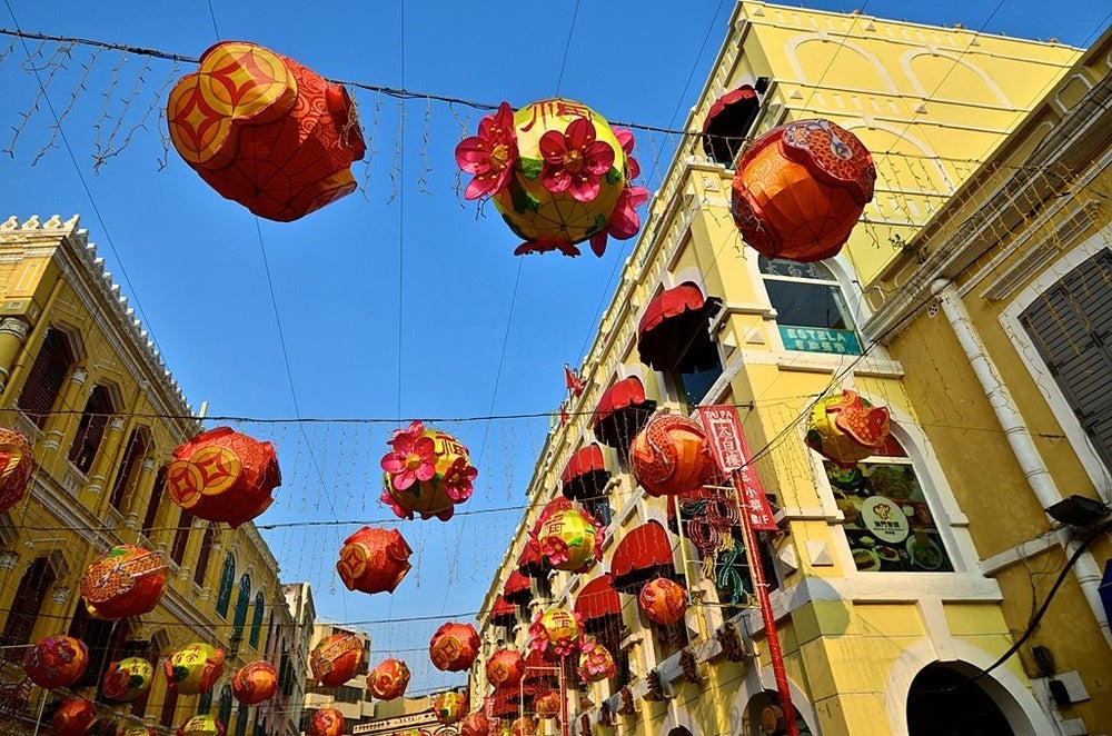 A large number of colourful lanterns, in preparation for