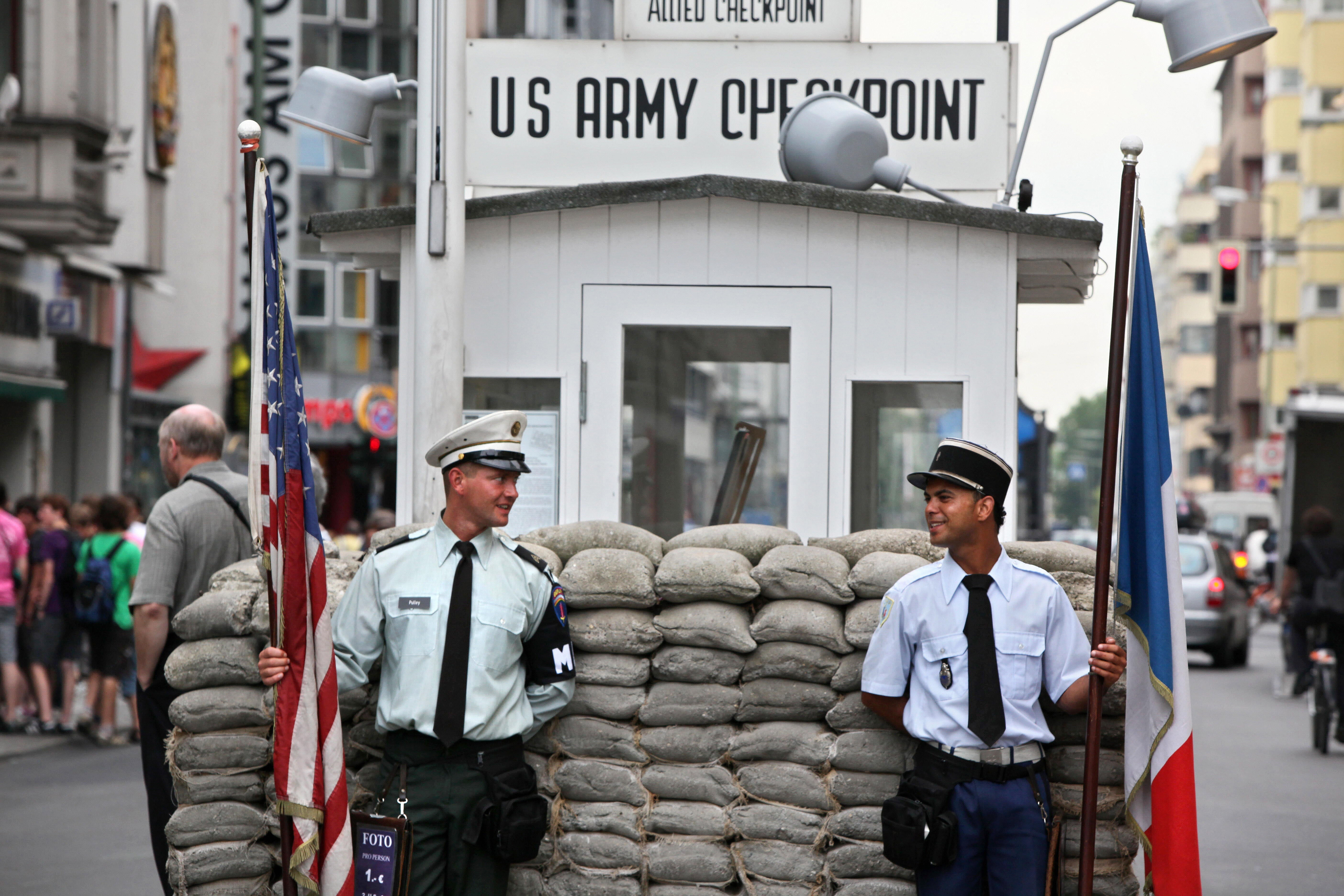 Performing artists dressed up as US Mili