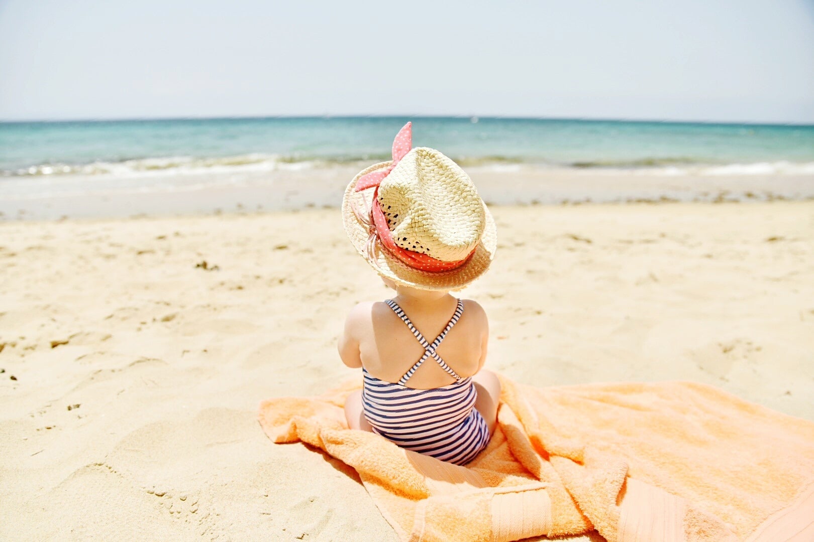 Rear View Of Child On Beach