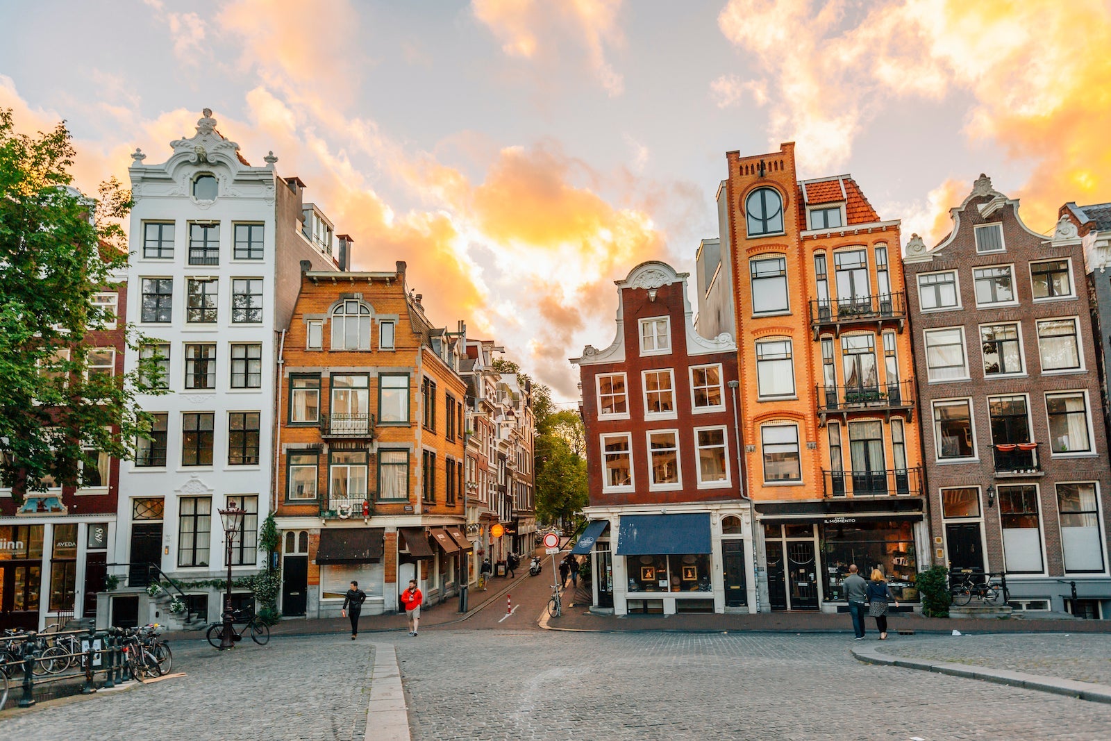 Traditional Dutch old houses in Amsterdam at sunset, Netherlands