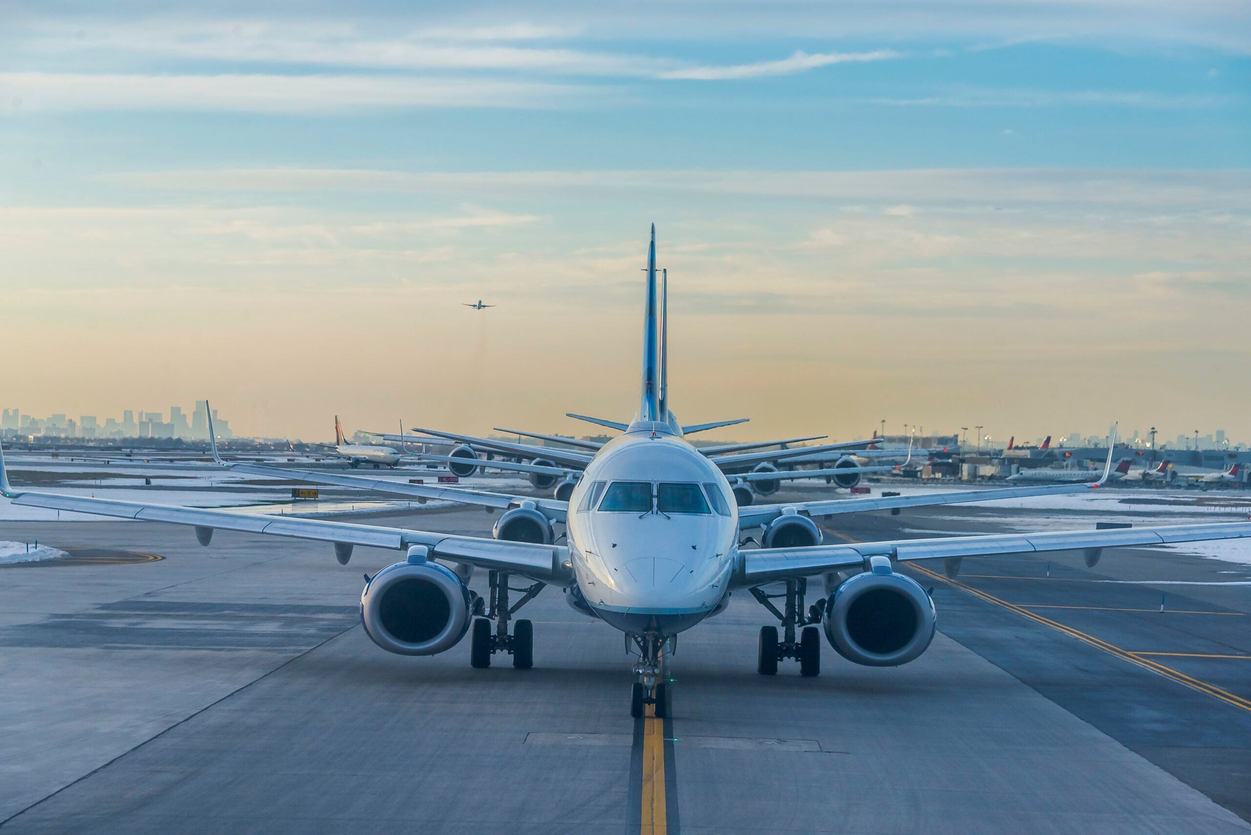 Airplanes lined up on runway