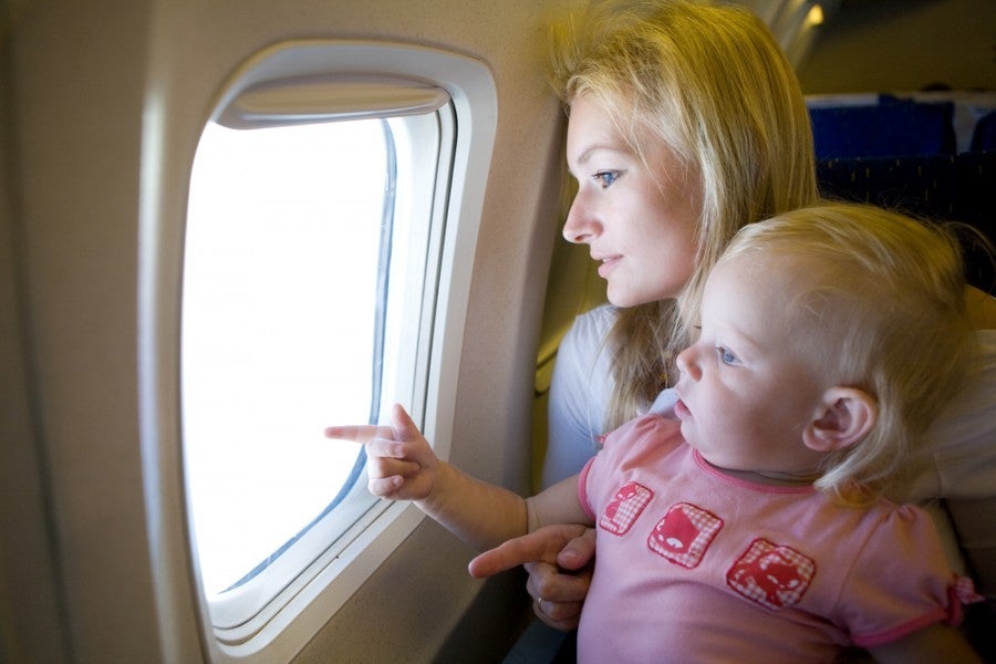 Baby Airplane Family Shutterstock 31621051