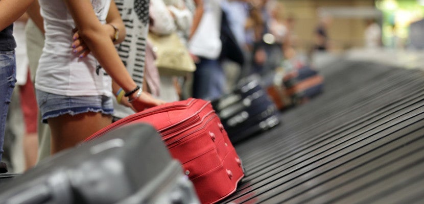 luggage carousel shutterstock_153920459