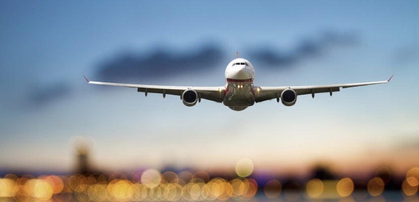 Airplane taking off featured