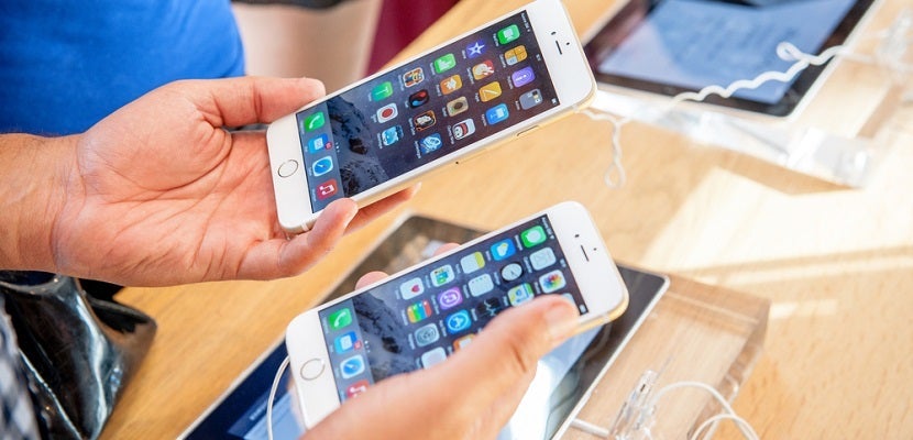 iPhone shopping electronics featured shutterstock 218533315