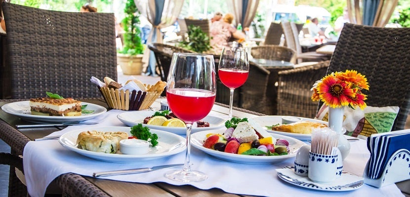 Dining restaurant table food featured shutterstock 206010964