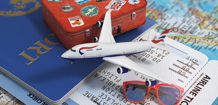 Passport ticket plane luggage featured shutterstock 290501264