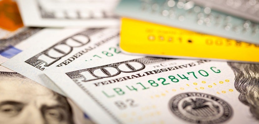 Credit cards and cash featured shutterstock 196399979