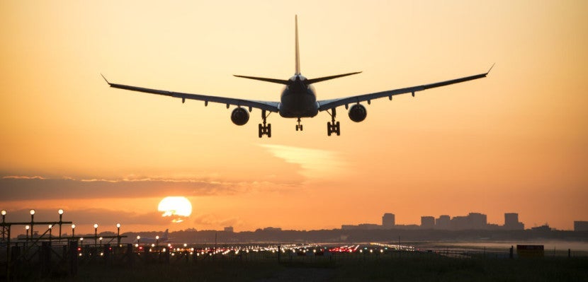 Plane landing from behind featured shutterstock 281588774