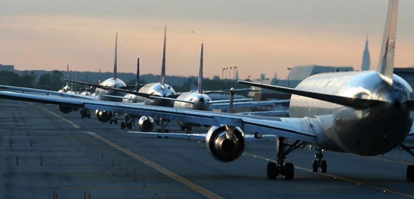 Airplanes-line-on-runway-banner-shutterstock-1826627