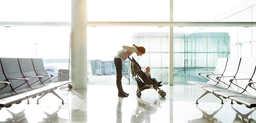 Mother with baby at the airport