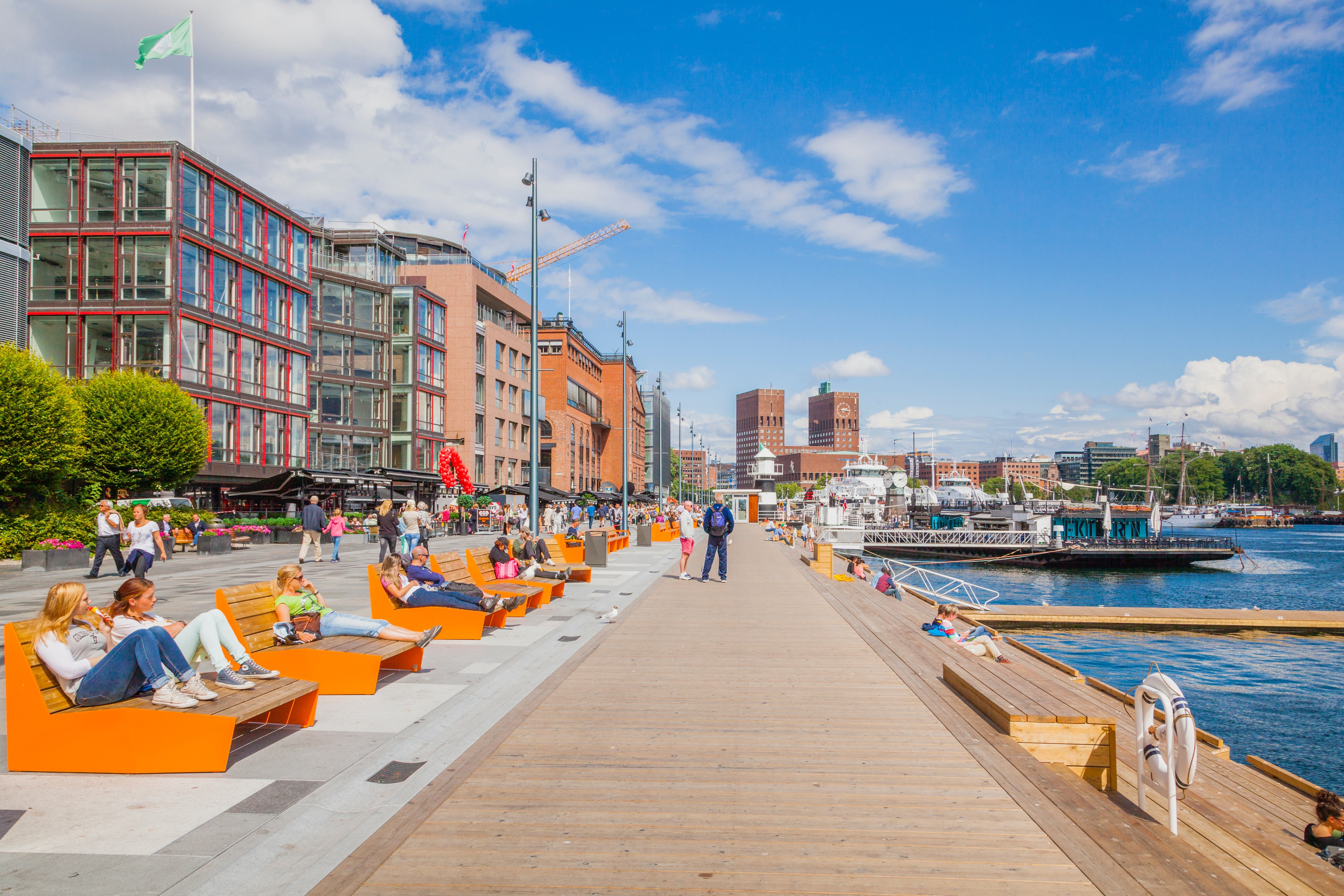 People enjoying at harbour