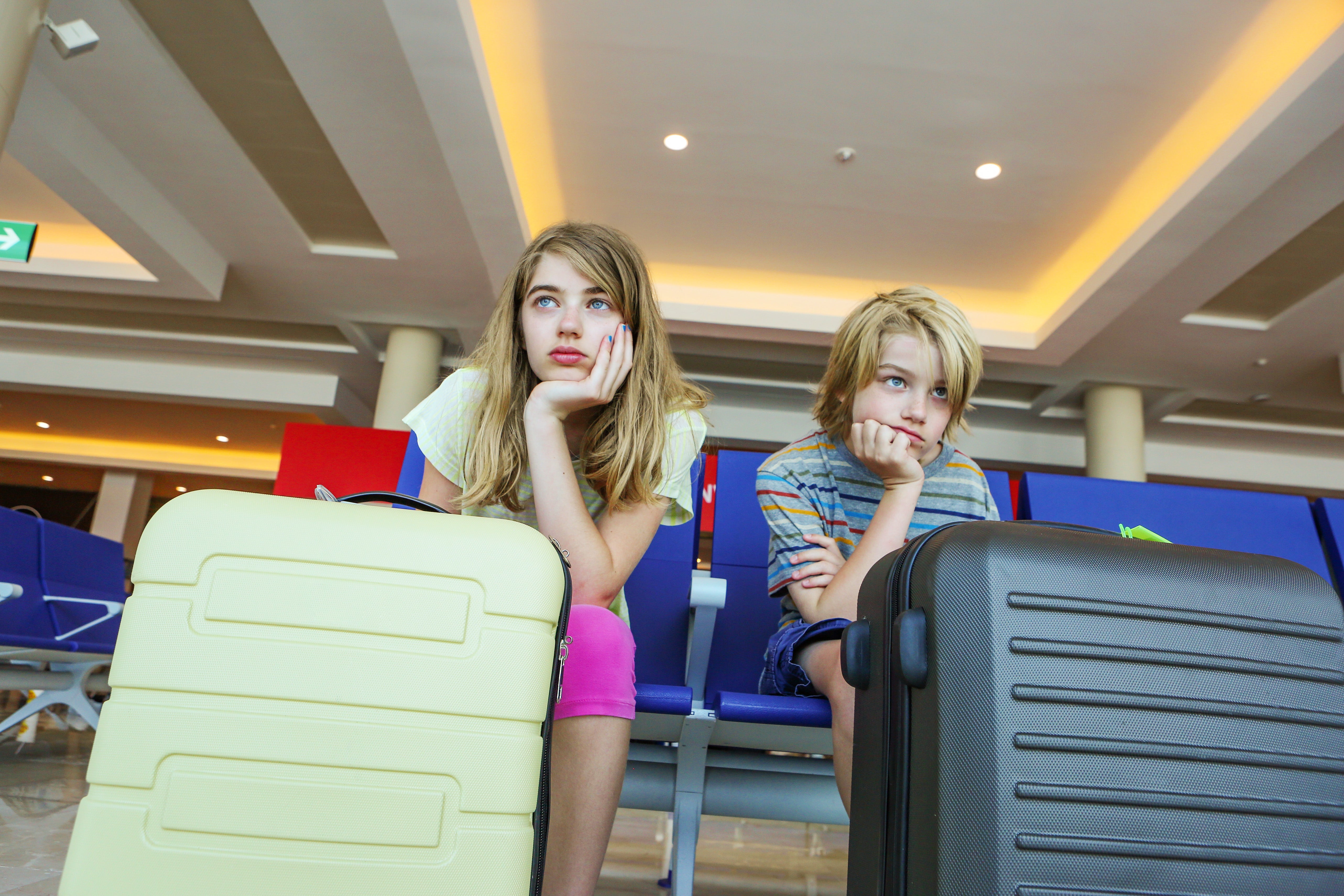 Kids waiting for flight in airport
