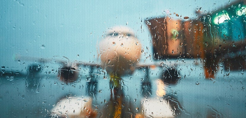 Close-Up Of Wet Window In Rainy Season