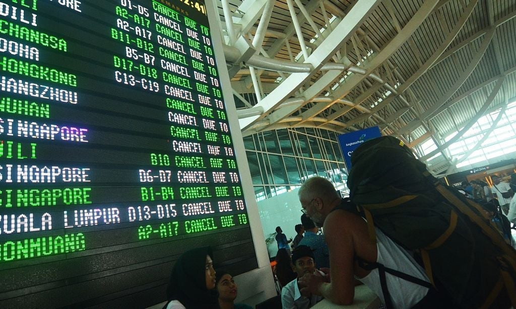 Bali airport reopens as Mt. Agung ash shifts direction