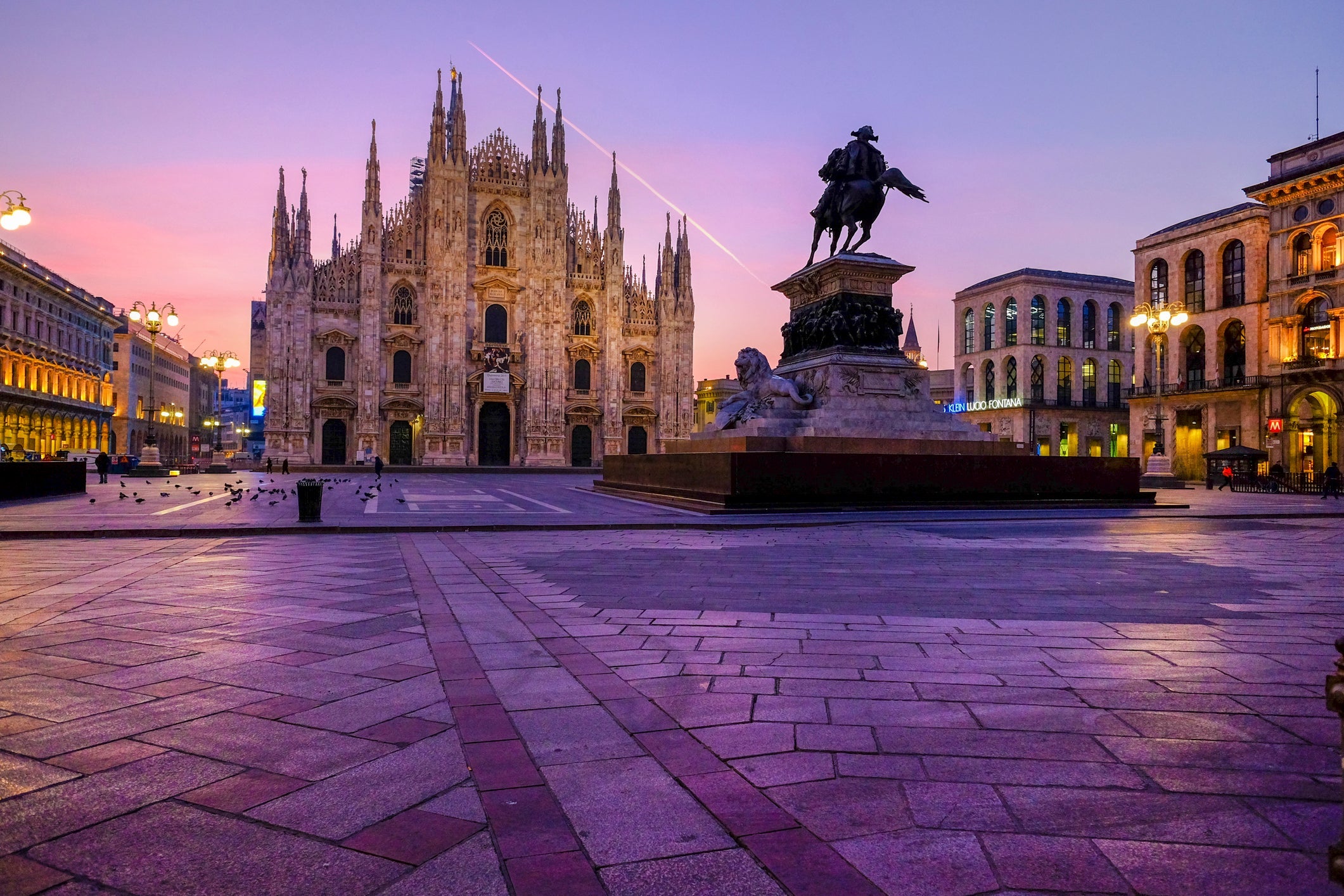 Italy, Milan, Cathedral with equestrian statue Vittorio Emanuele II in the morning