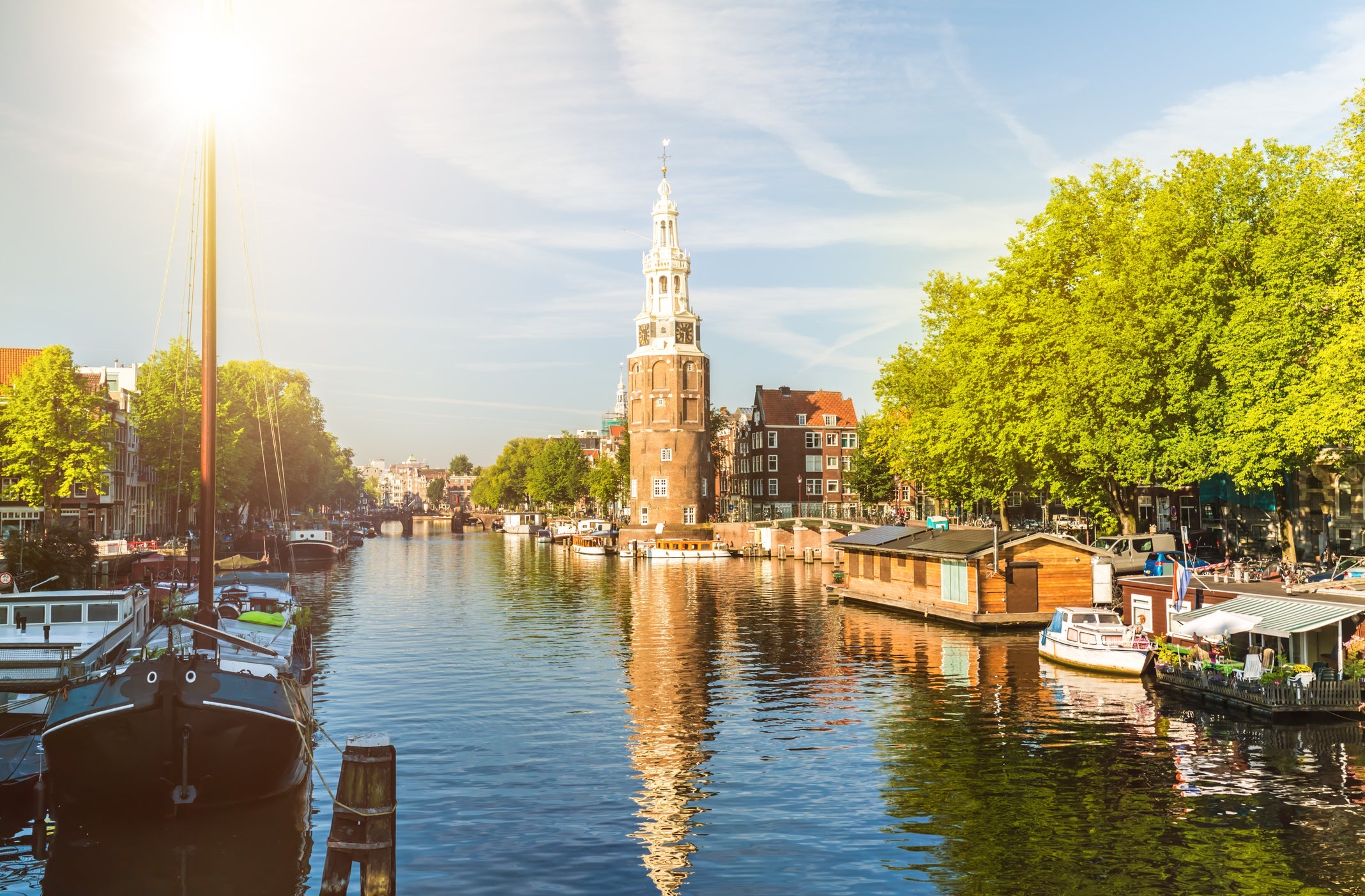 Amsterdam Canal with houseboats and ships
