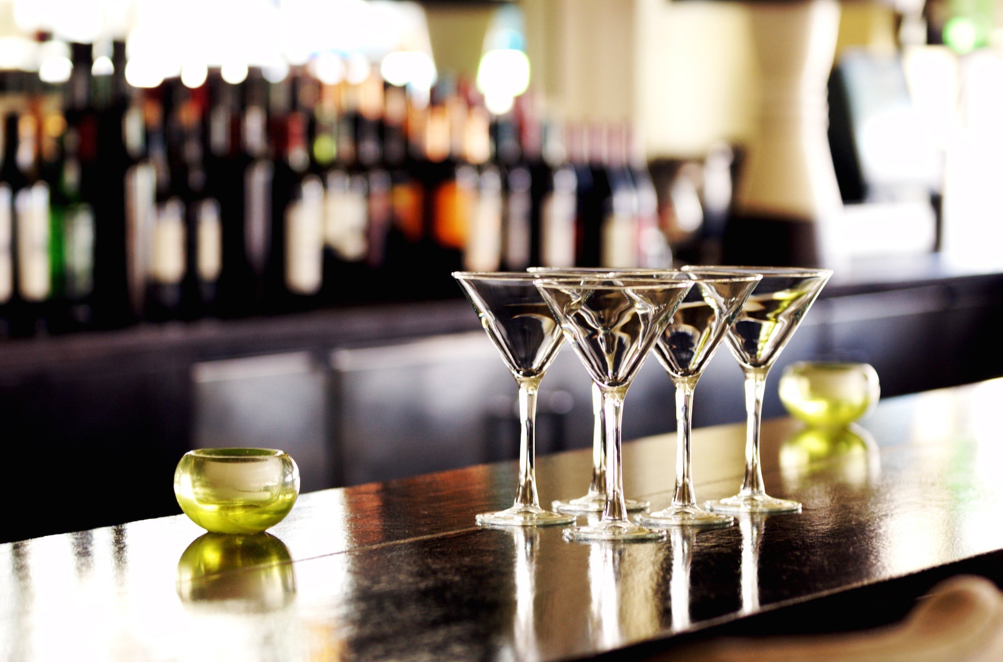 Four Martini Glasses on Bar