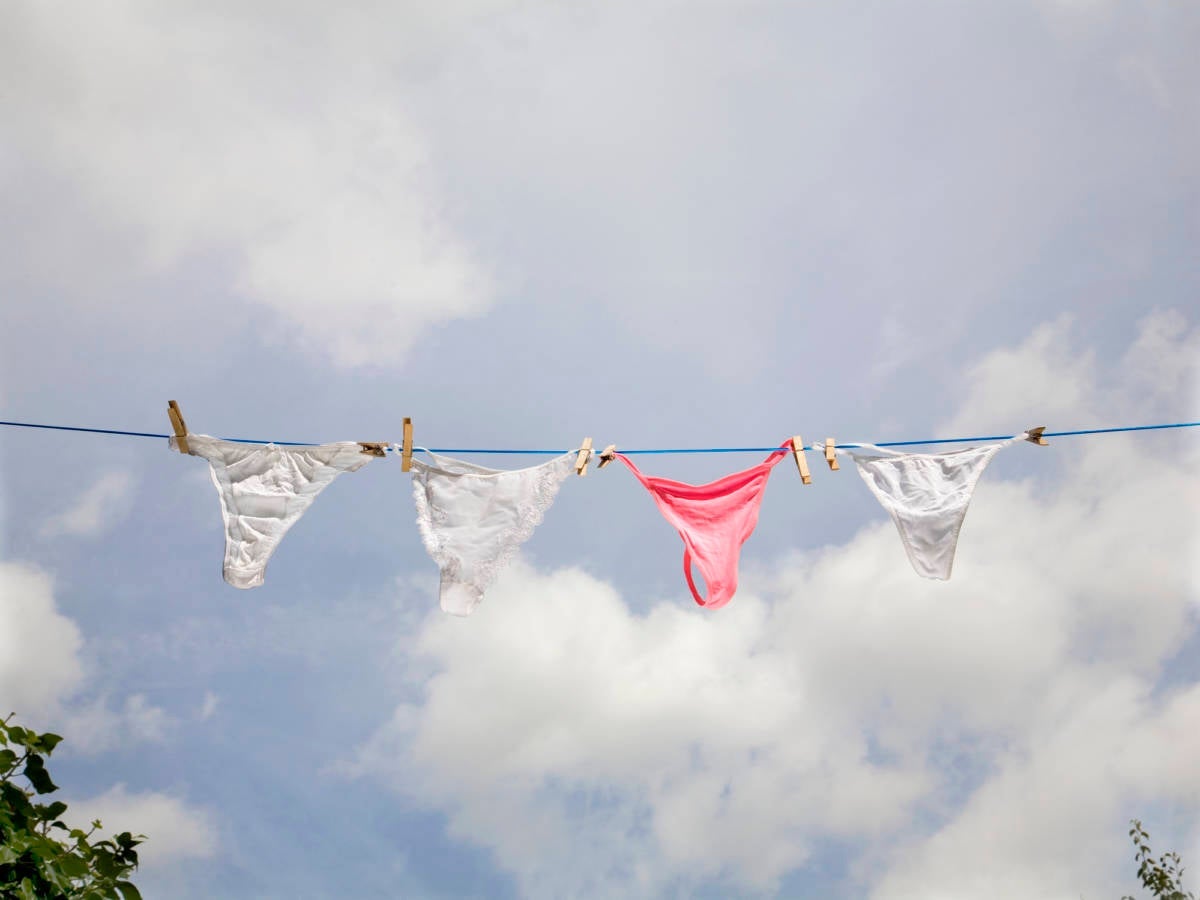 Women's underwear hanging on washing line