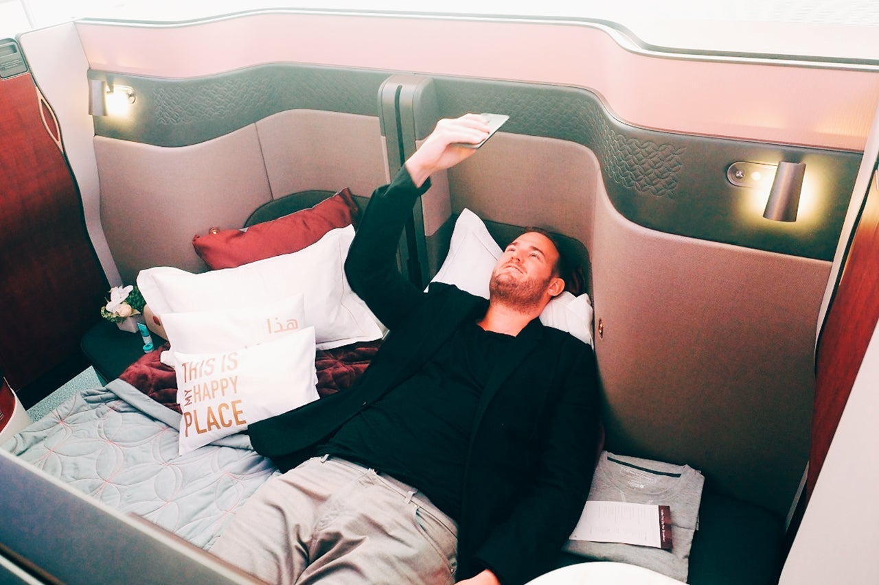 Qatar-Airways-unveiling-ceremony-TPG-testing-lie-flat Brian Kelly