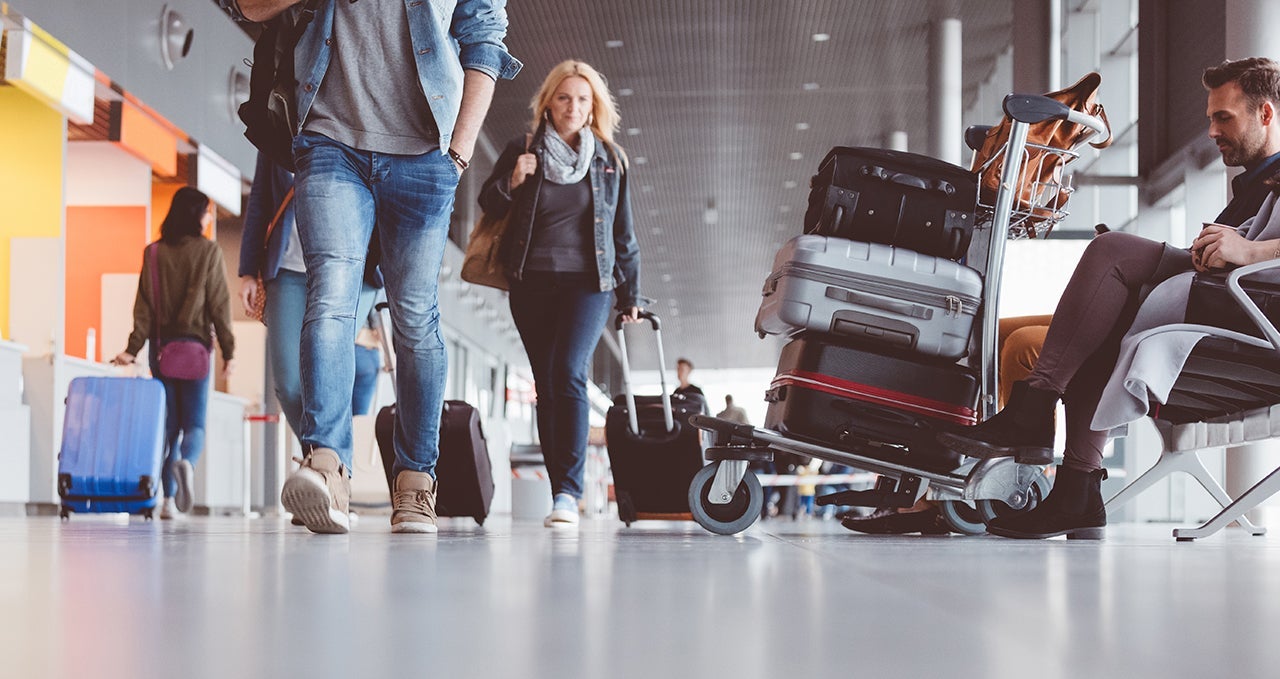Busy airport terminal with passengers