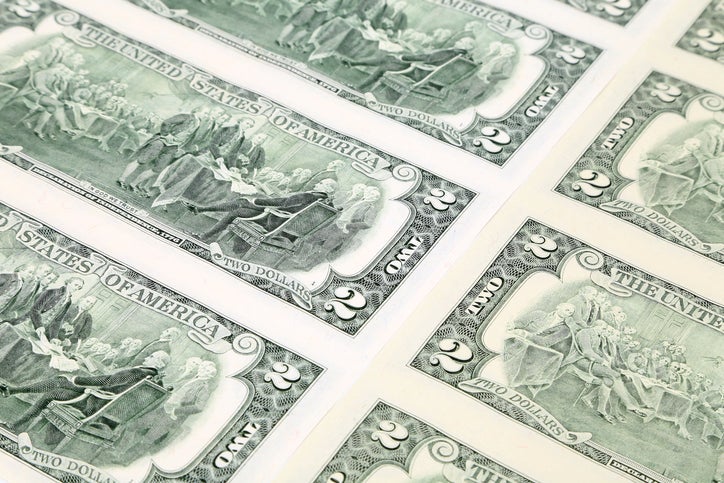Close up of two-dollar bills.