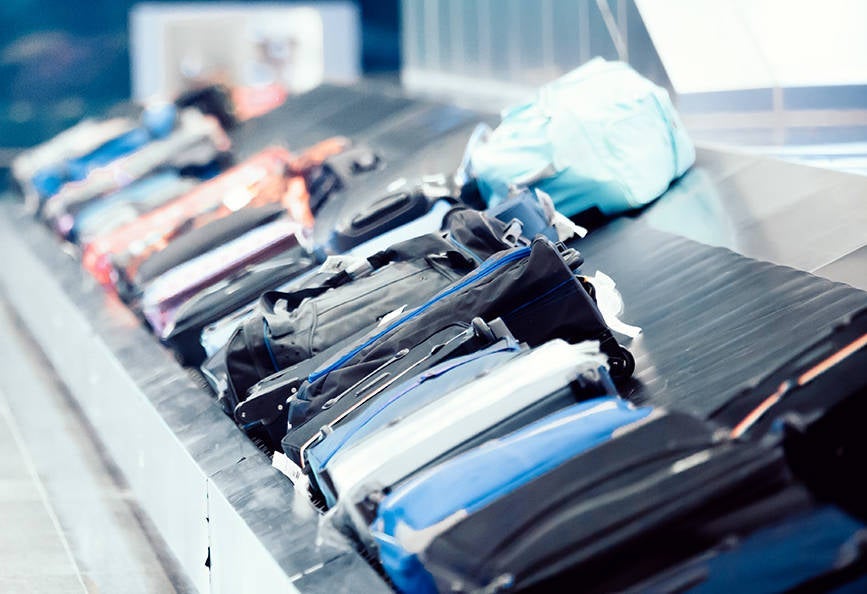 Young man waiting for baggage