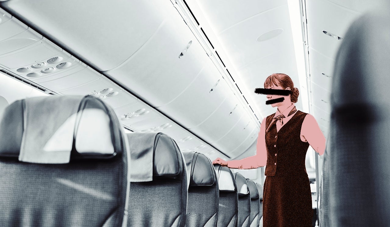 Female flight attendant on empty airplane