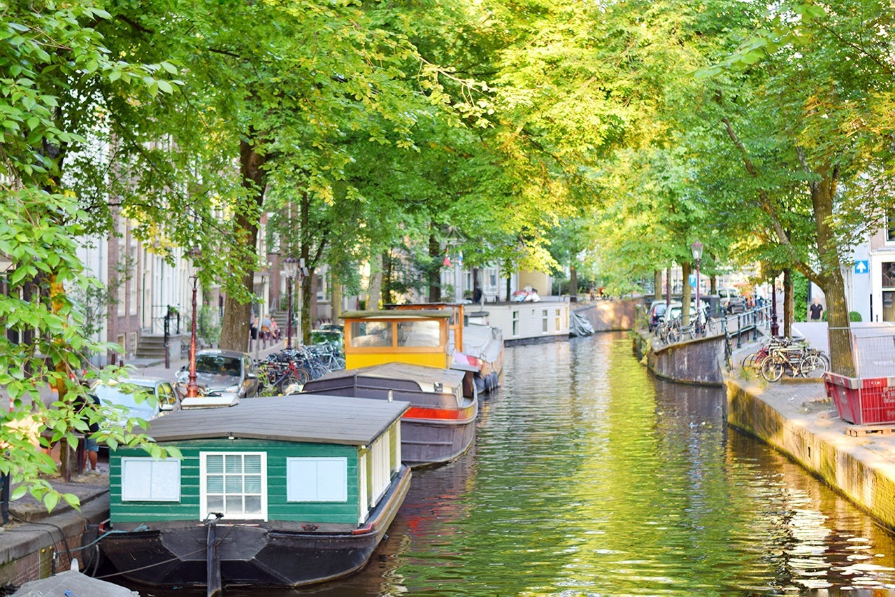 Boats Moored In Water, Amsterdam