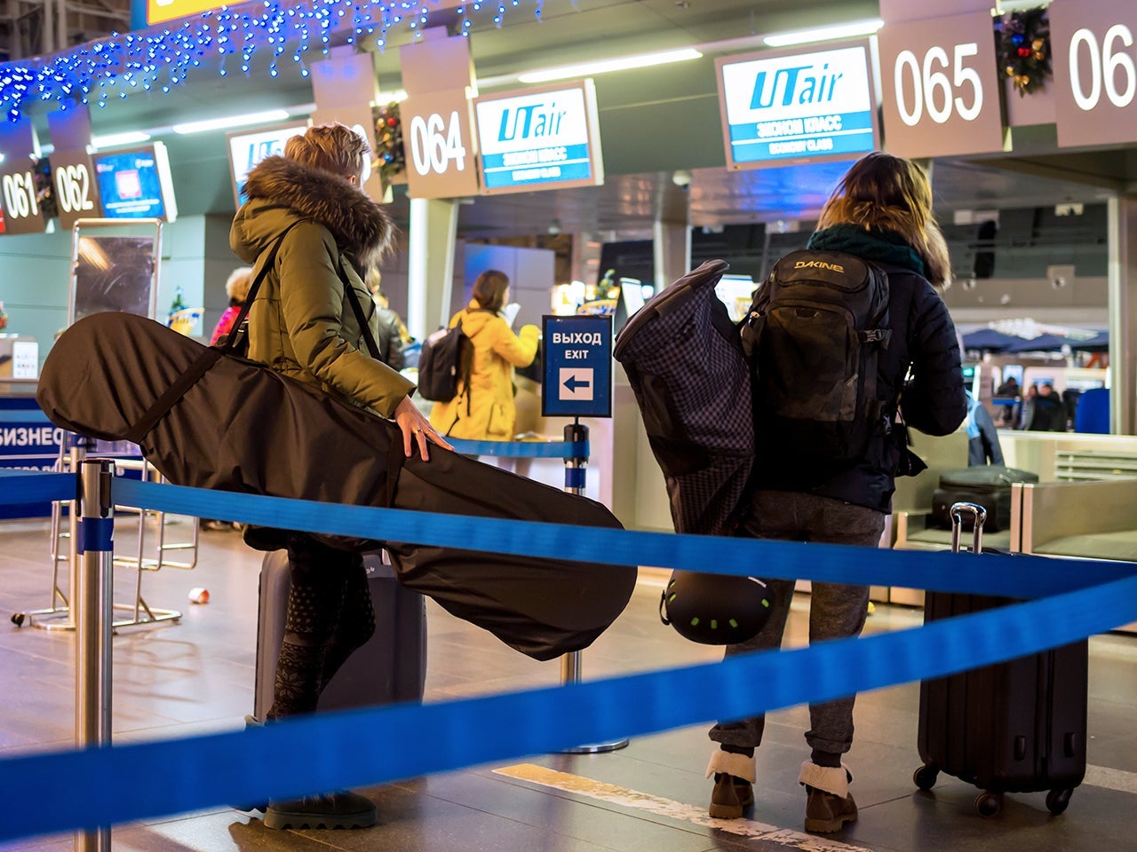 Passengers with inventory for the winter sports awaiting registration