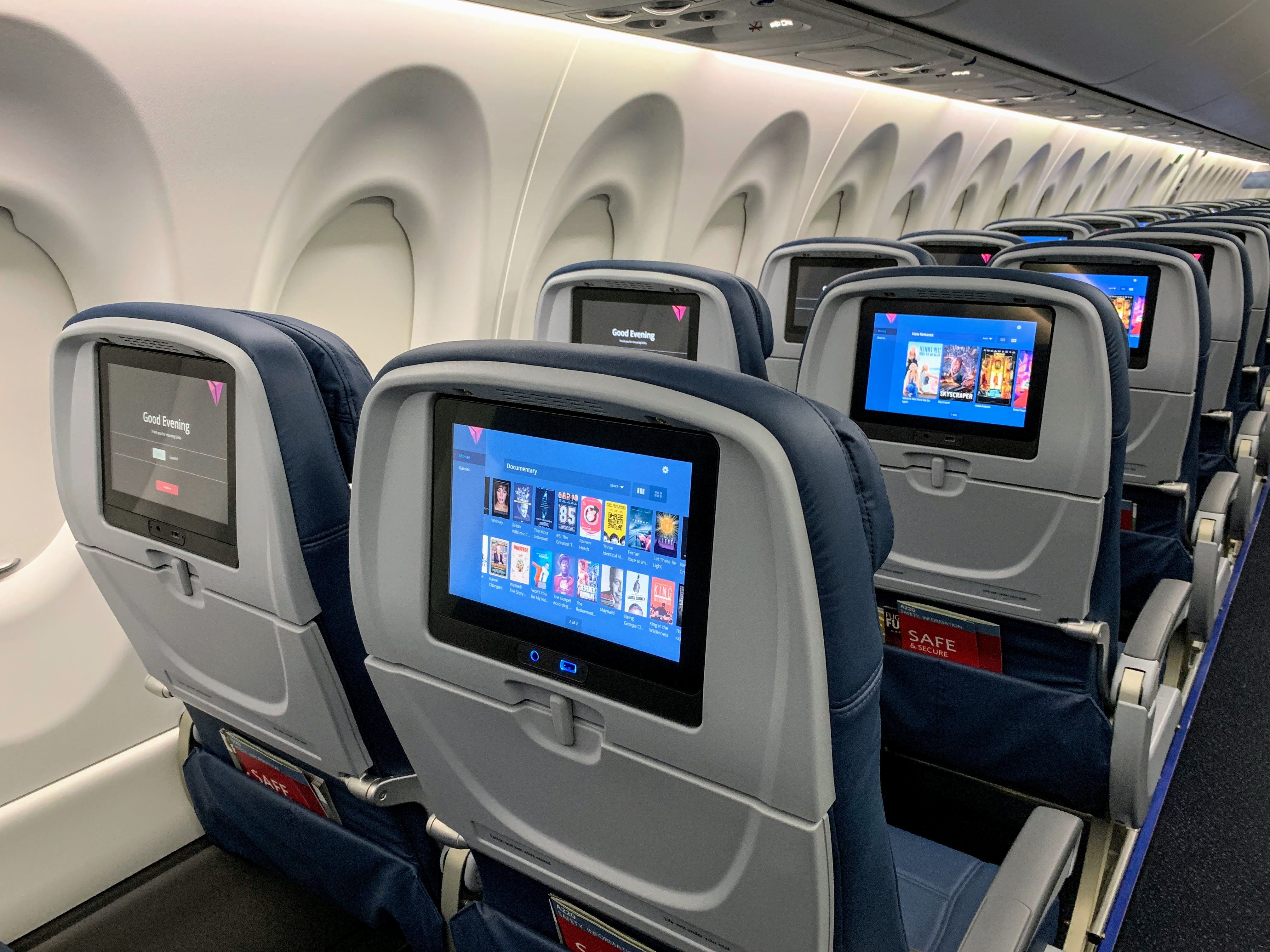 Delta Airbus A220 C Series CS100 Preview at ATL - main cabin IFE screens back