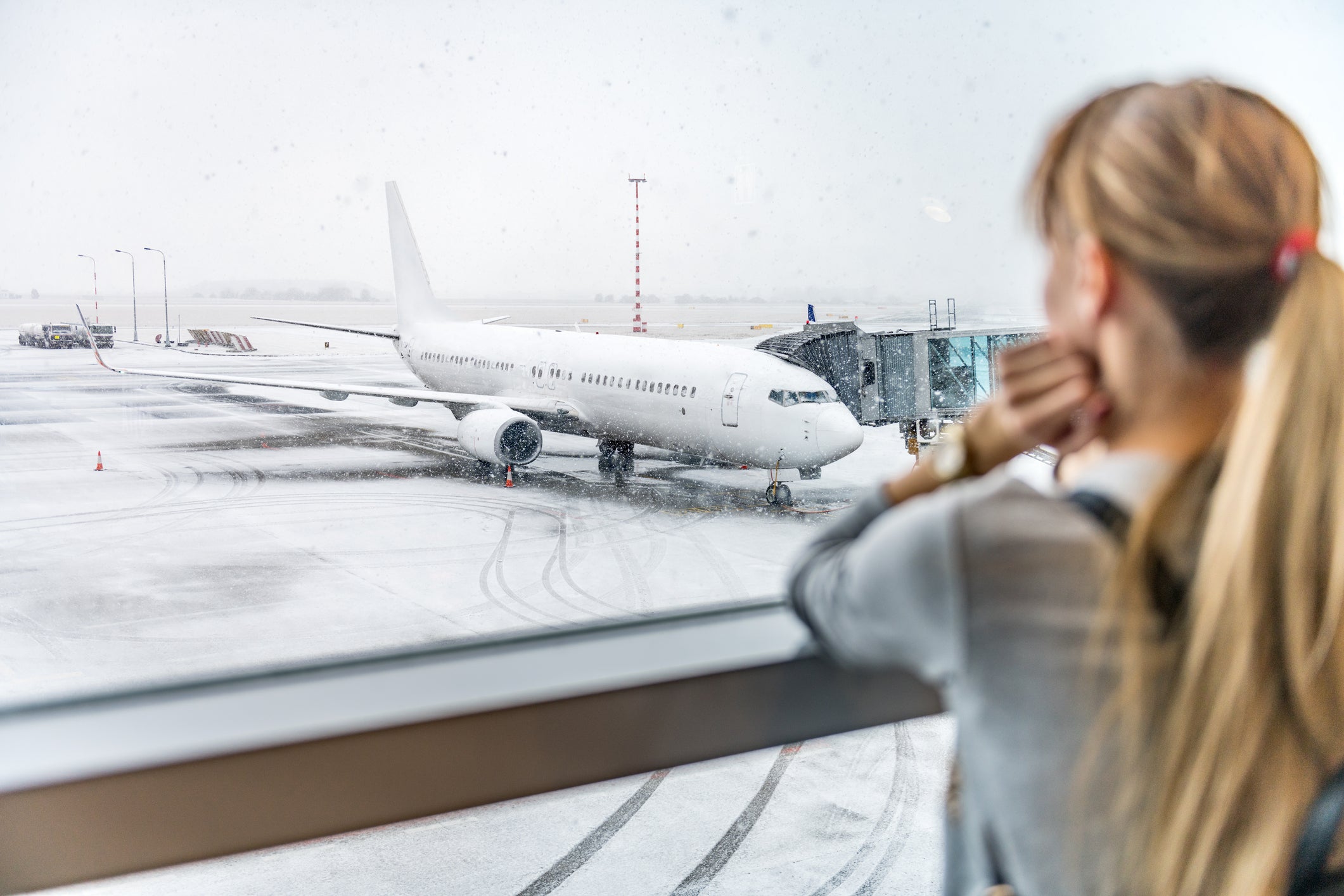 Young woman waiting for boarding