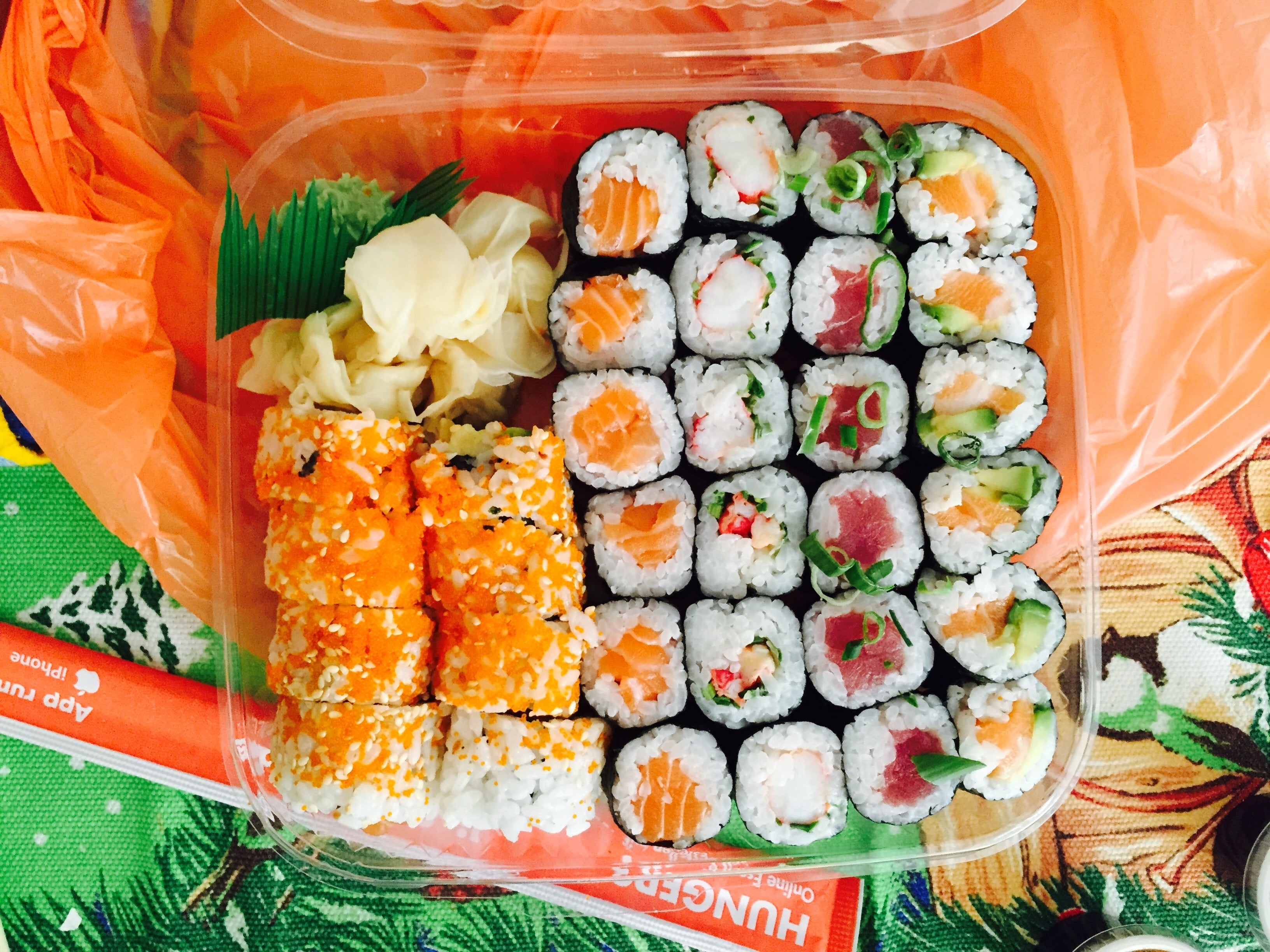 Close-Up Of Sushi In Plastic Container