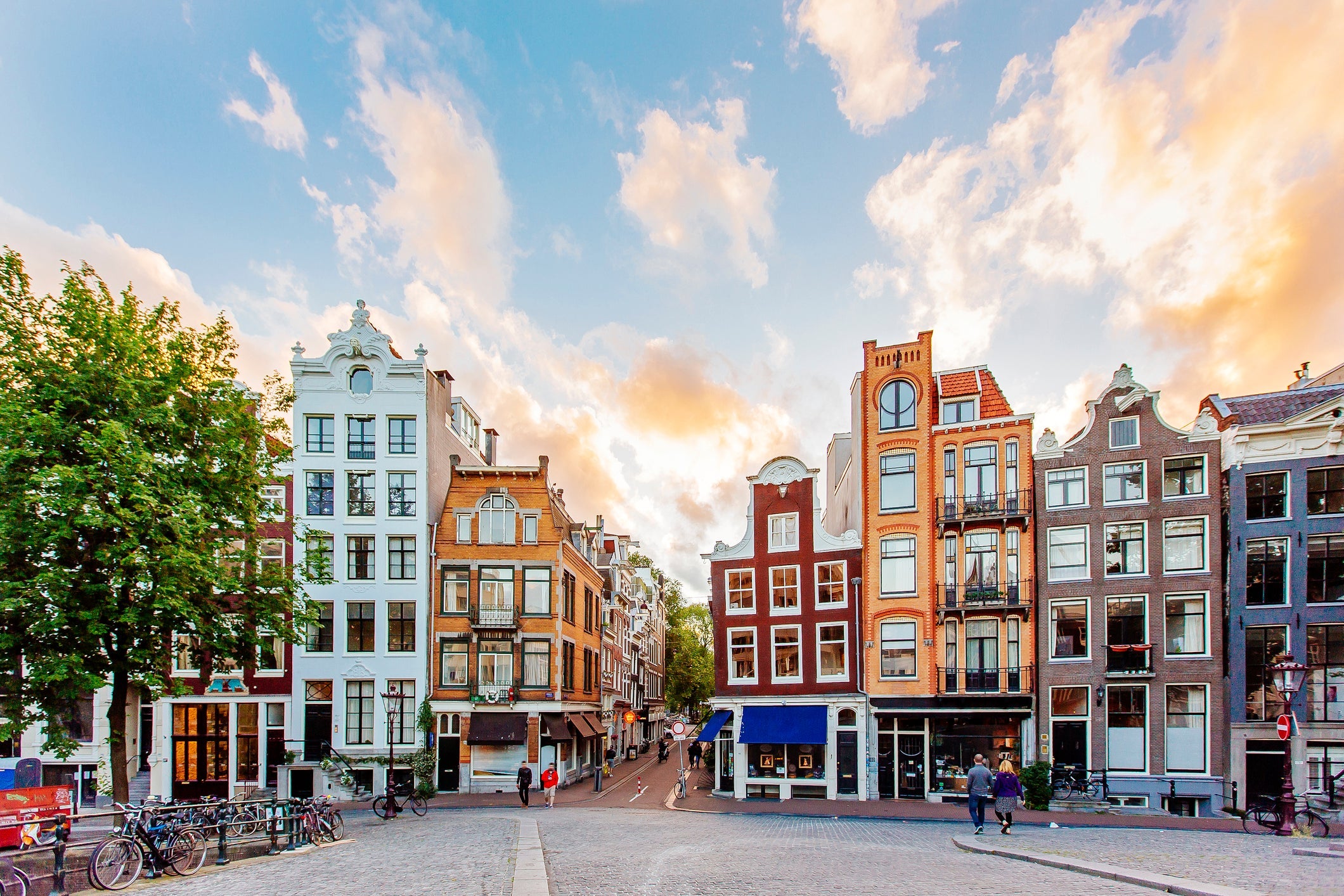 Amsterdam skyline with traditional Dutch houses during sunset, Holland, Netherlands