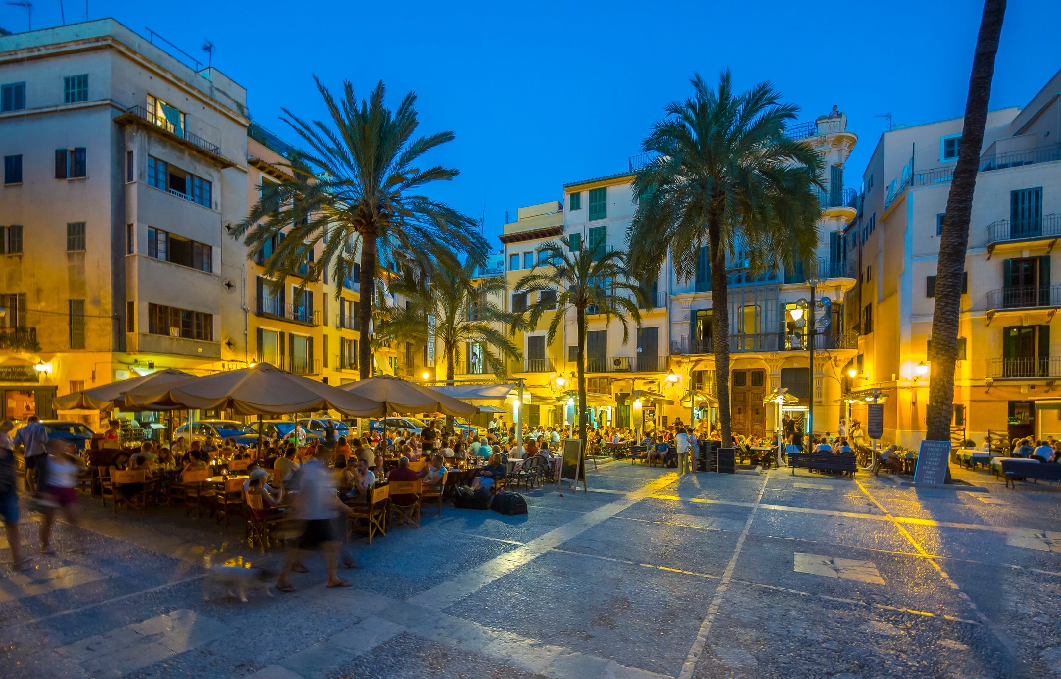 Spain, Mallorca, Palma de Mallorca, restaurants at Paseo Sagrera by night