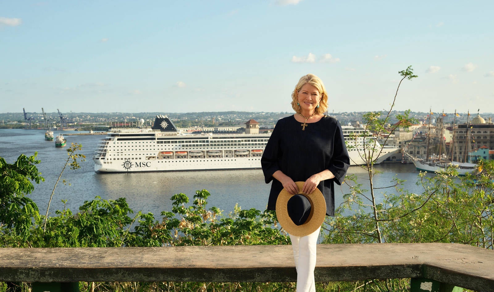 Martha Stewart in front of ship