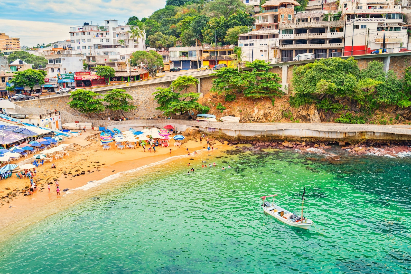 Beach with Boat in Acapulco Mexico