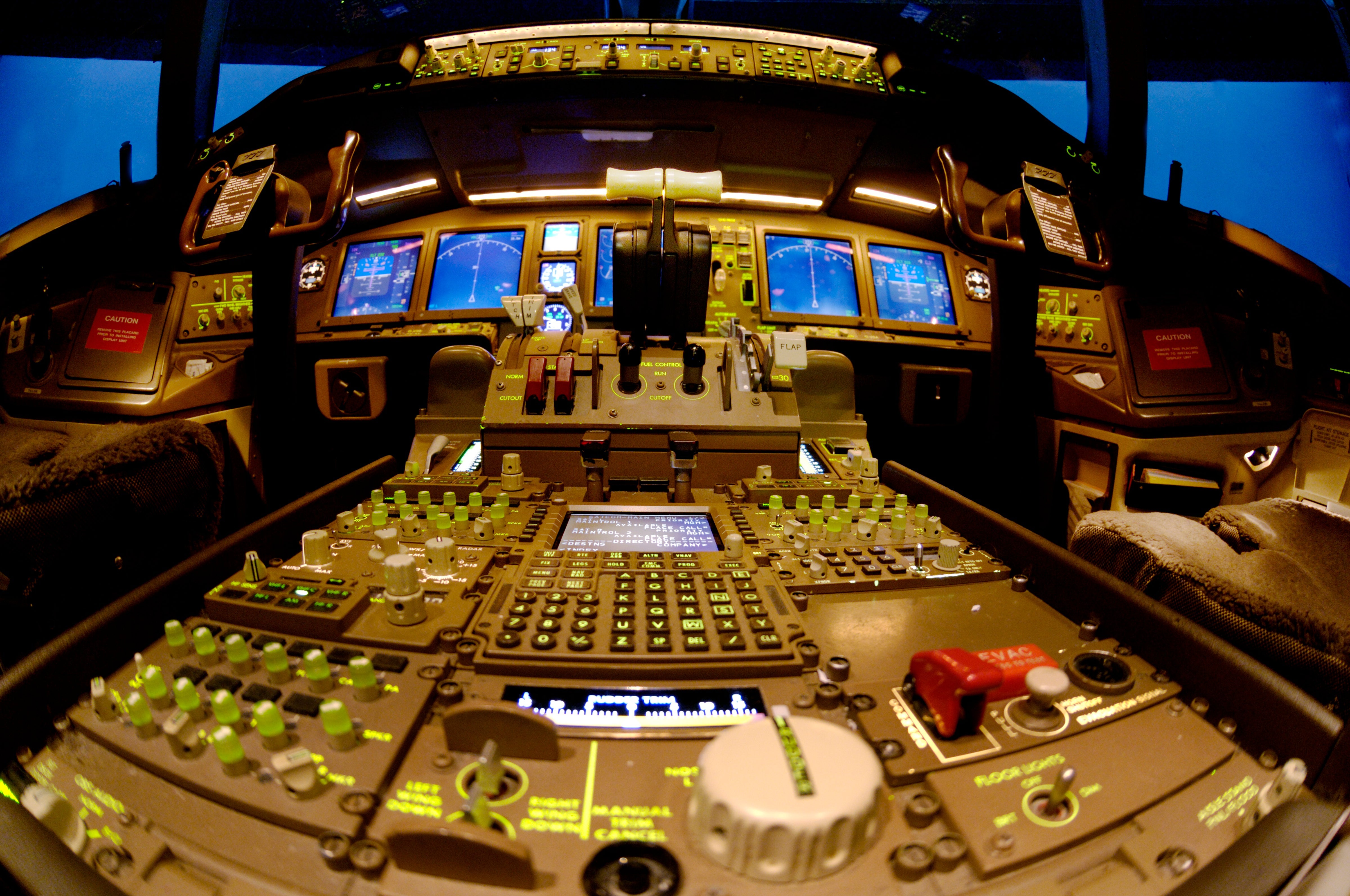 throttles and controls in the CAE Boeing 777-236 glass-cockpit cockpit simulator with Evans
