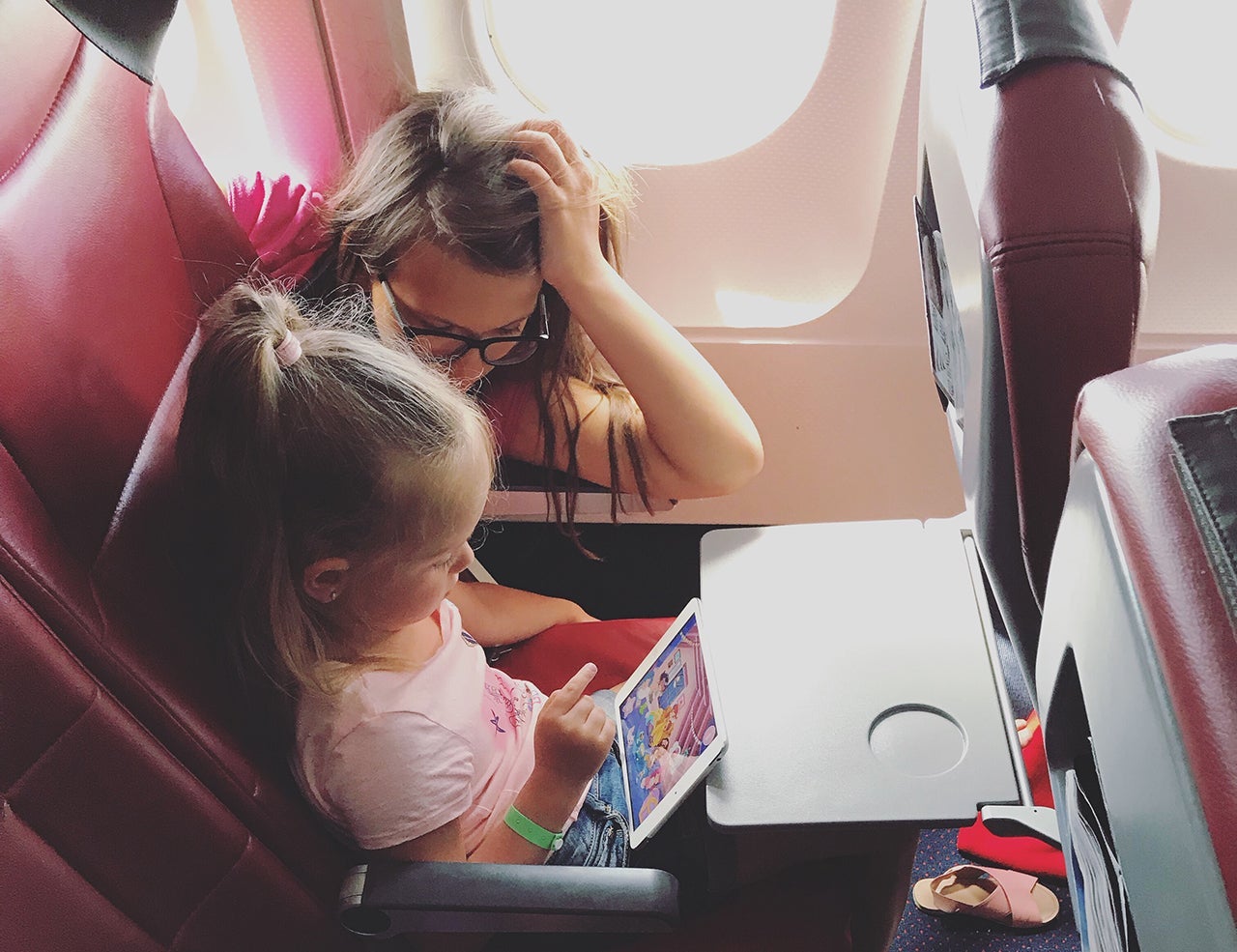little-kids-and-children-flying-in-airplane-sleeping-and-playing-with-tablet-device-small-child-in_t20_29poEv