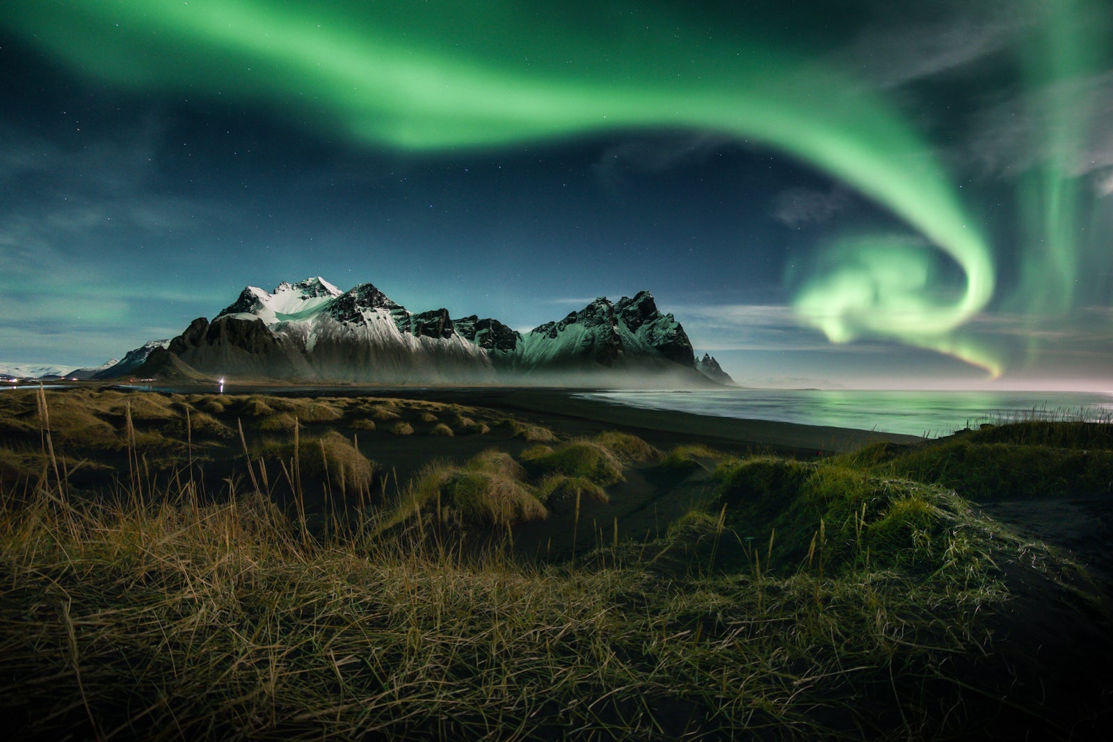 northern lights over Vestrahorn moutain , Iceland