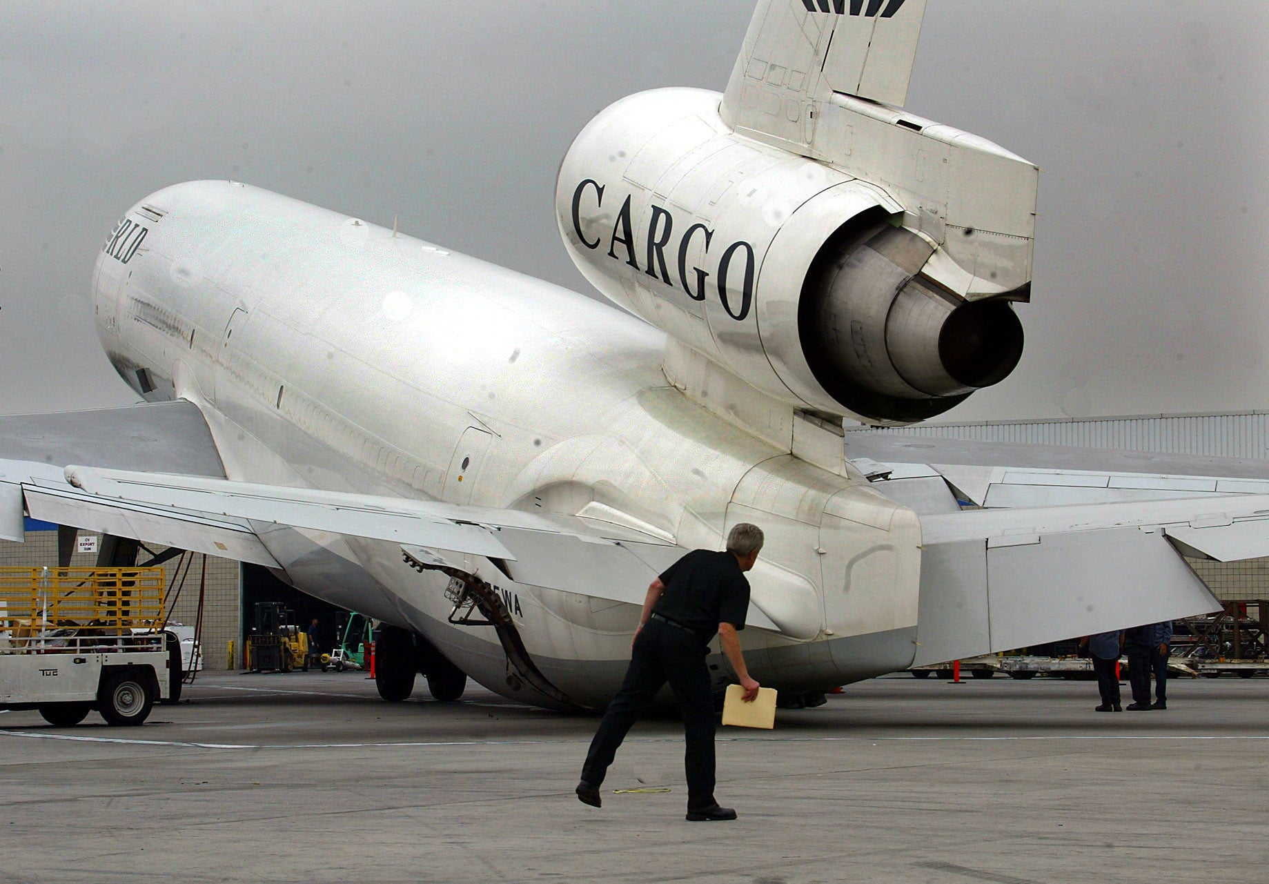 Scene at LAX at icc space 5 which is Southeast portion of airport where at "World Cargo" an MD11 car