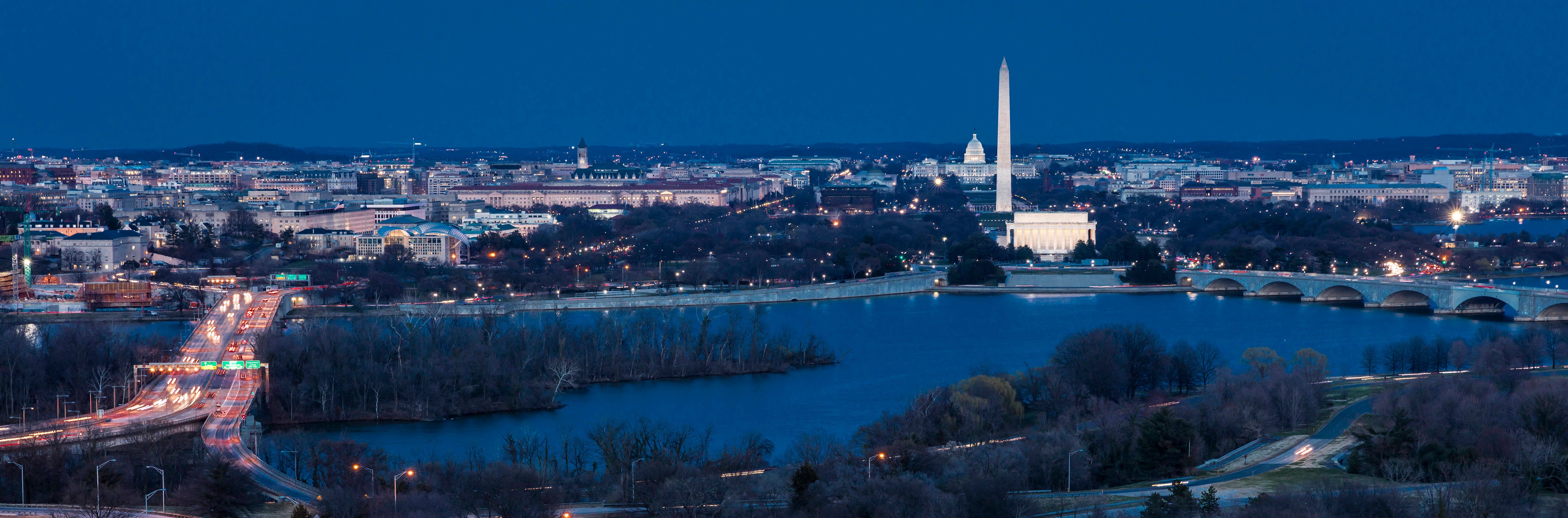 Aerial view of Washington D.C. shows Lincoln & Washington Memorial and U.S. Capitol