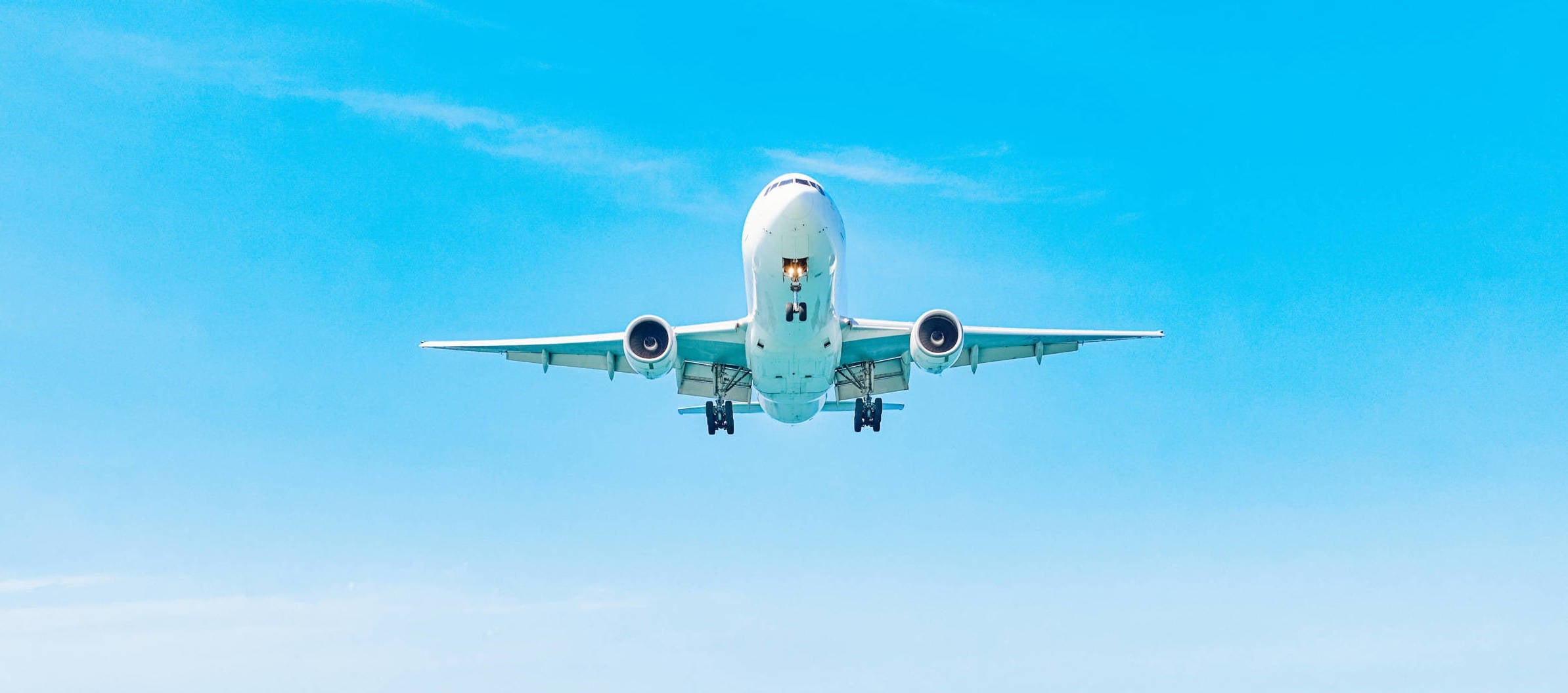 Plane is landing over water