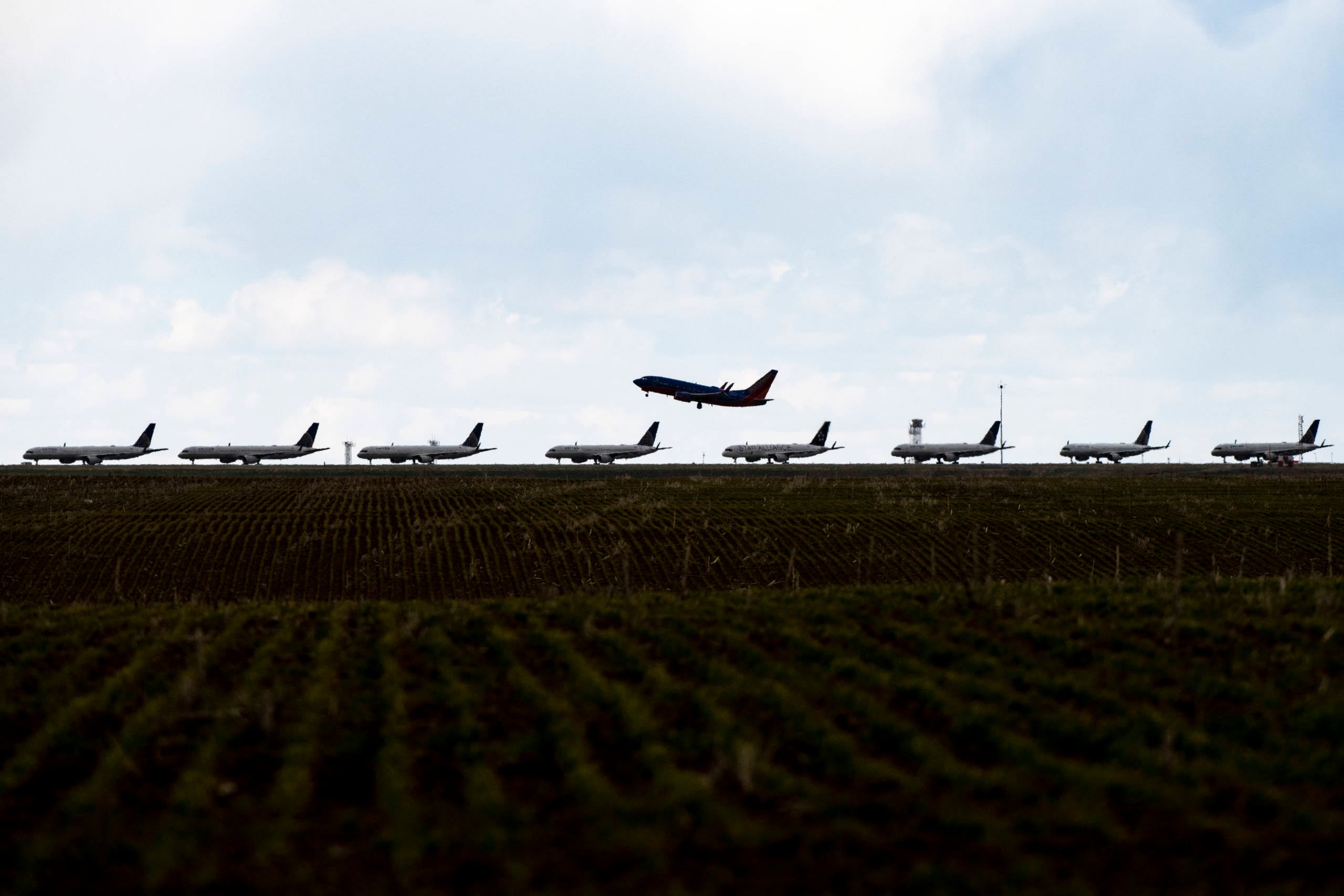 United Planes Sit Parked At Denver International Airport, As The Coronavirus Pandemic Severely Halts Airline Travel