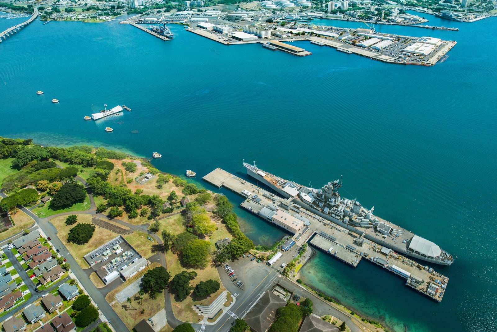 Aerial view of Arizona Memorial and Mighty Mo Missouri battleship at Pearl Harbor, Honolulu, Hawaii, USA
