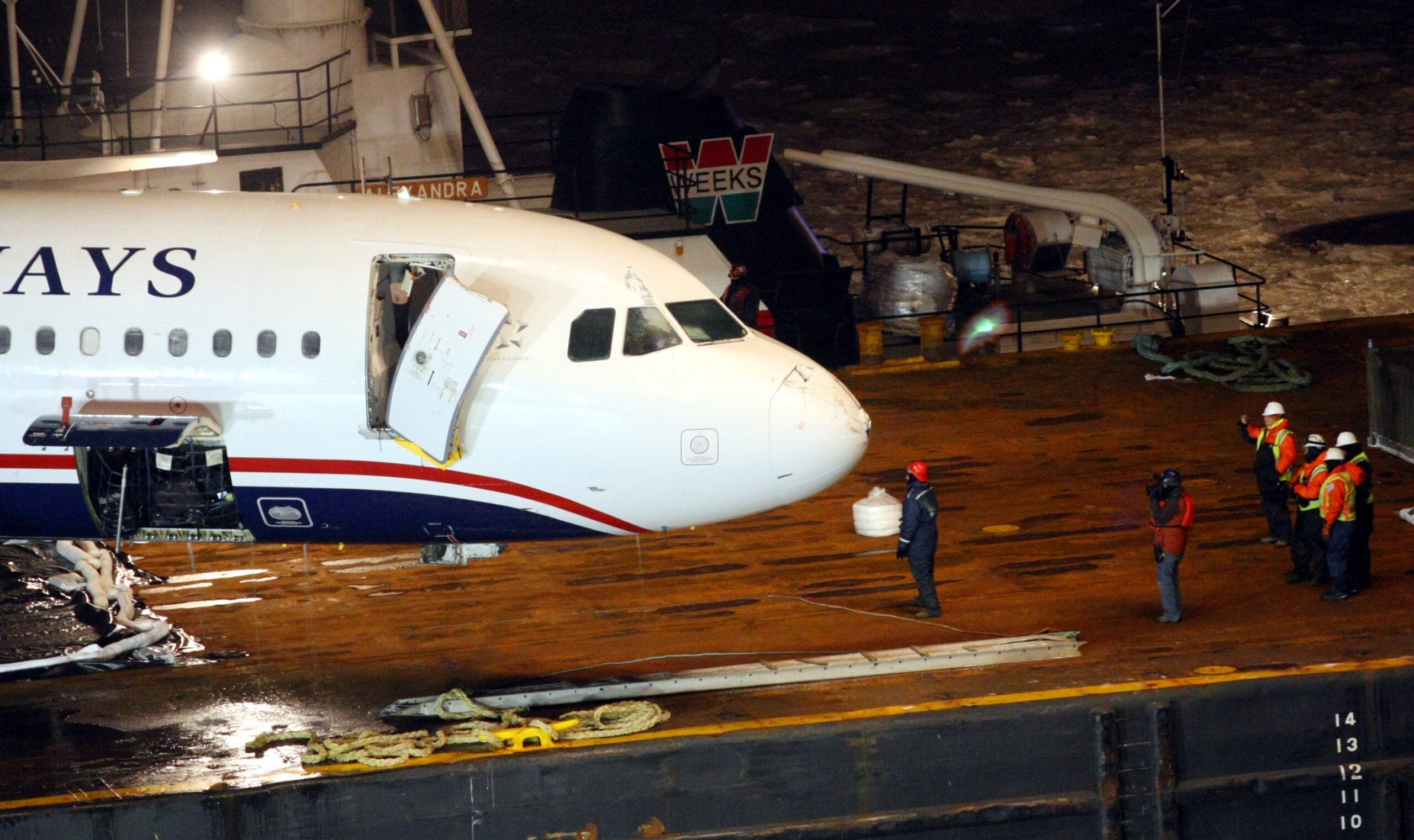 Workers Prepare To Lift The US Airways Plane Out Of Hudson River
