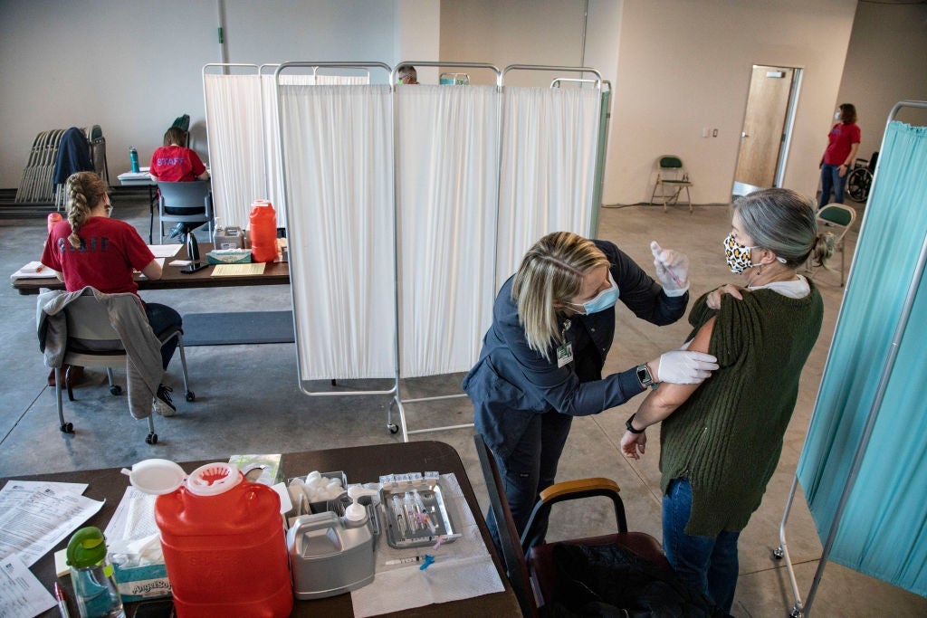 Cristi Hunkler, a retired school teacher receives the