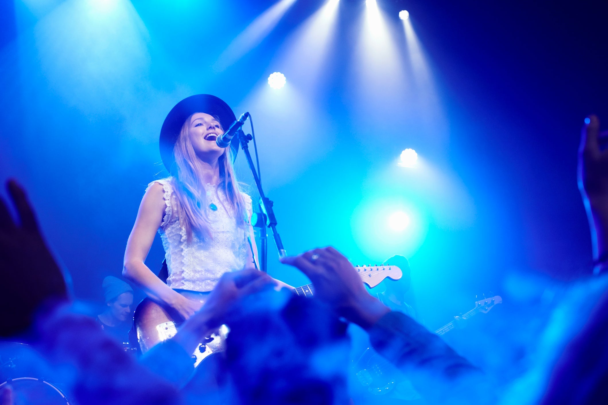 Band performing on stage at music concert