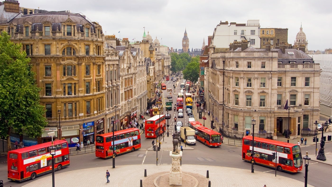 View down Whitehall of buses and Big Ben